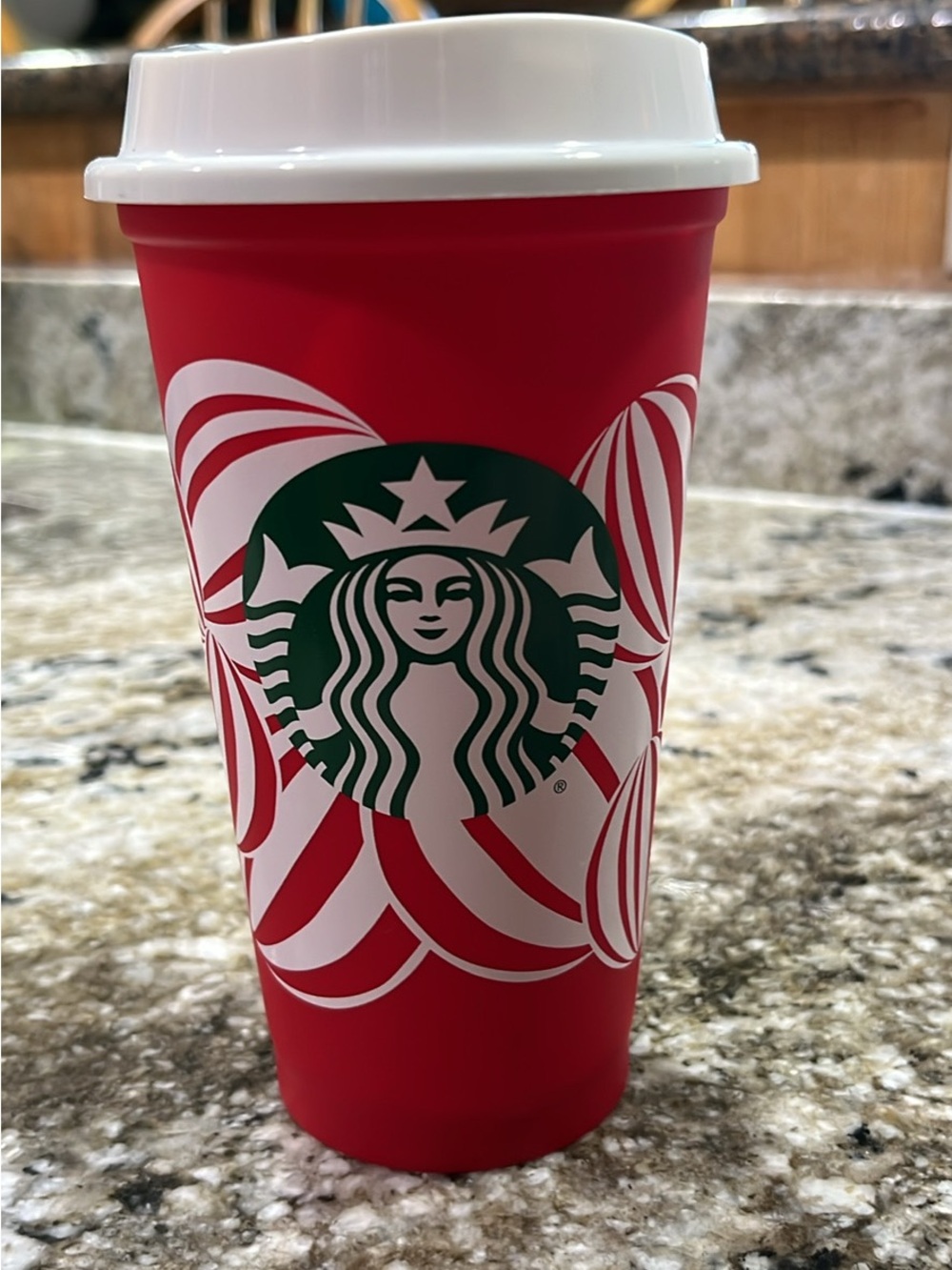 Starbucks Red Cup with Green Logo and White Lid